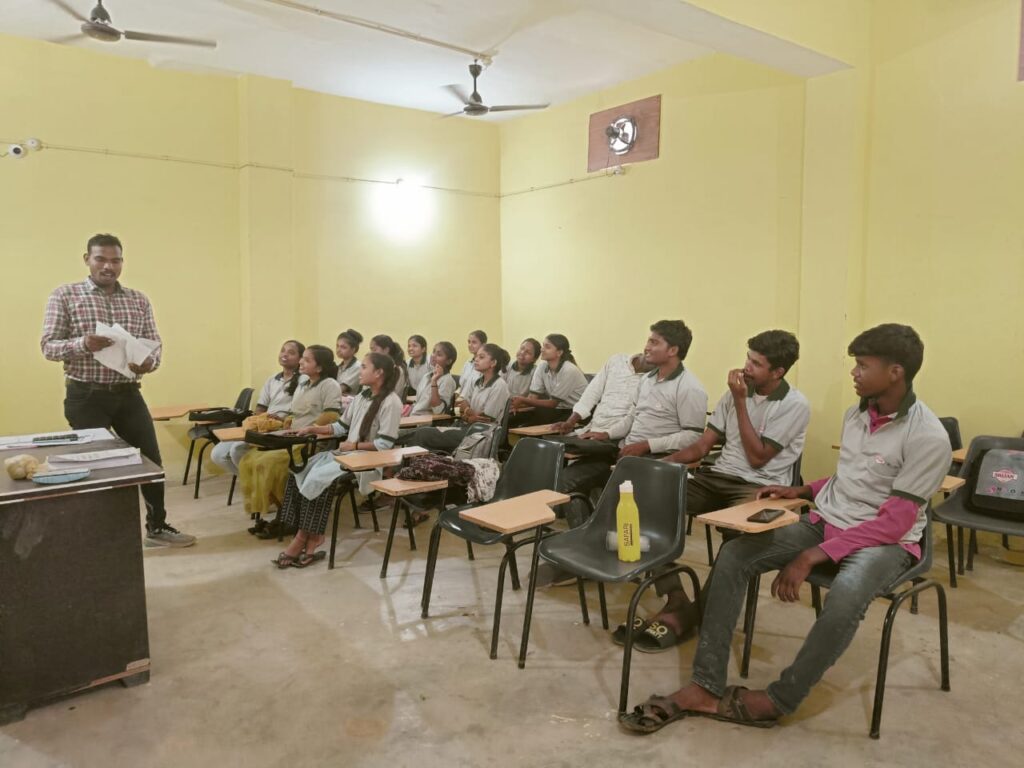 Trainer conducting a vocational training session for youth at an Orion Educational Society skill development centre in India